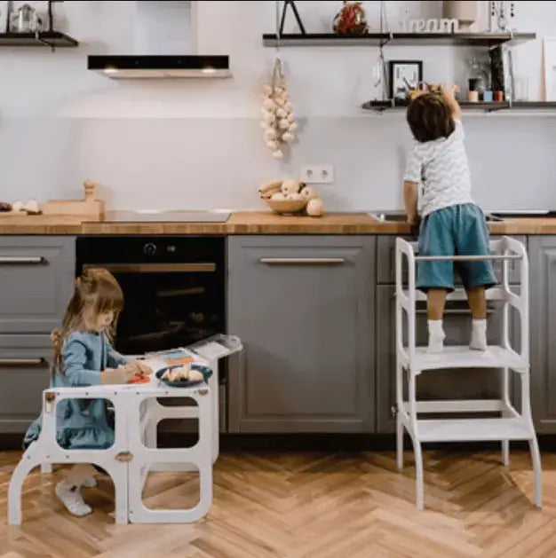 Toddler using STEP'n'SIT® as a kitchen helper at the counter
